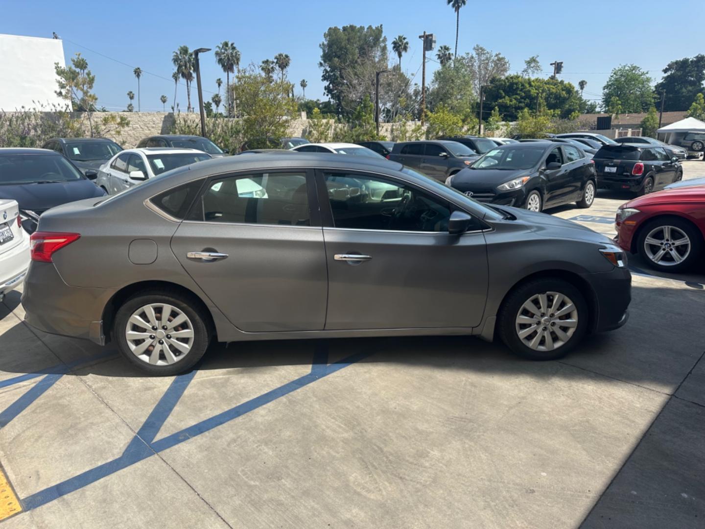 2016 Silver /Black Nissan Sentra FE+ S (3N1AB7AP7GY) with an 1.8L L4 SFI DOHC 16V engine, CVT transmission, located at 30 S. Berkeley Avenue, Pasadena, CA, 91107, (626) 248-7567, 34.145447, -118.109398 - Photo#4